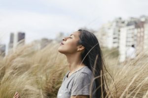 woman learning the connection between meditation and recovery