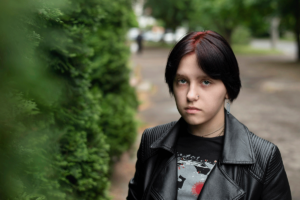 sullen and angry looking teenager begs the question what causes anger issues in a teenager