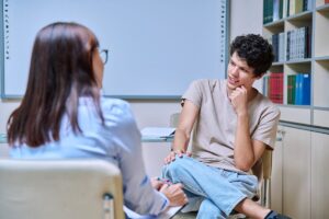 female therapist talking to teenager about finding an intensive outpatient program in Nampa, Idaho